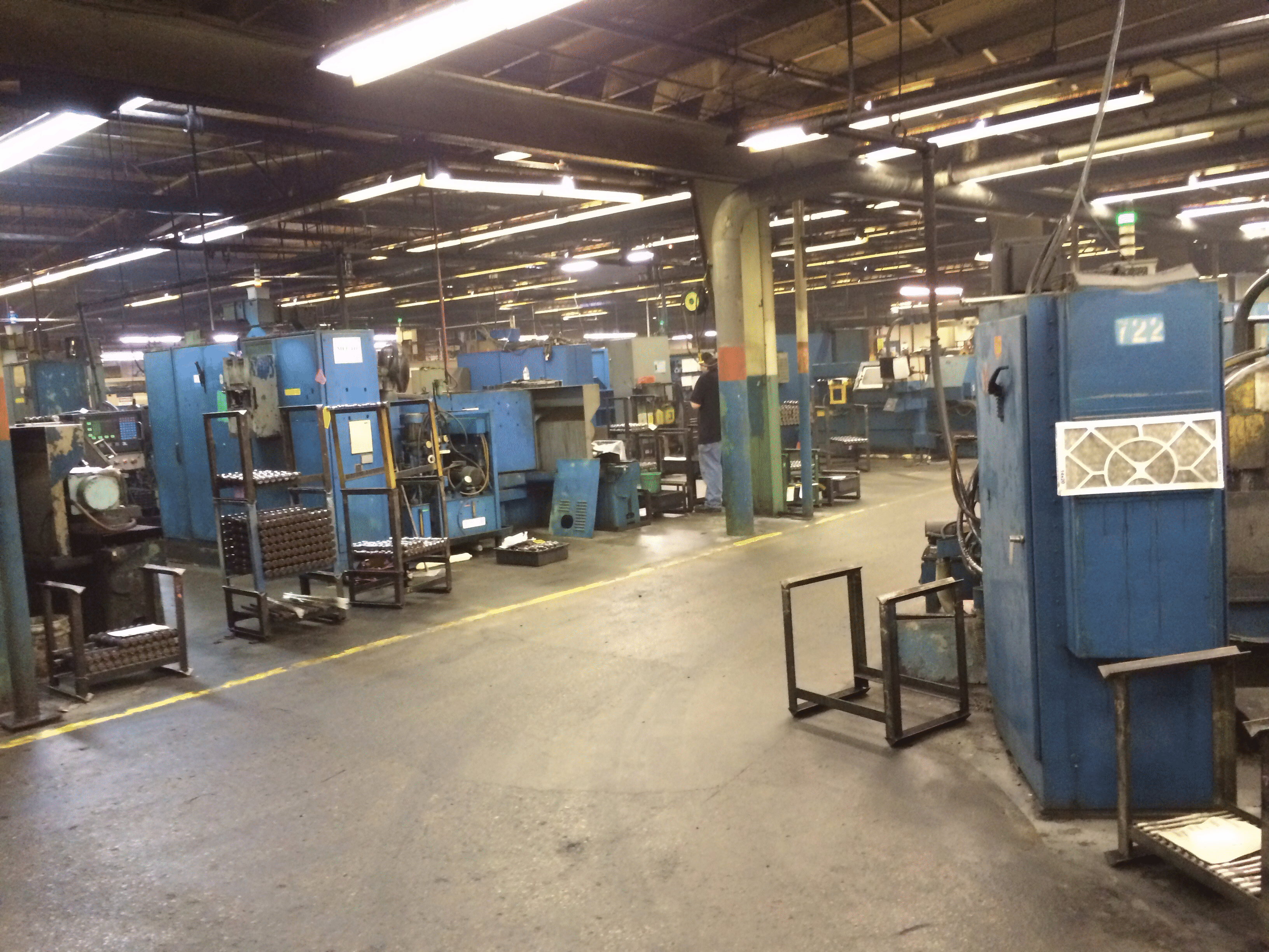 Photograph from inside the factory showing the machinery lineups.
